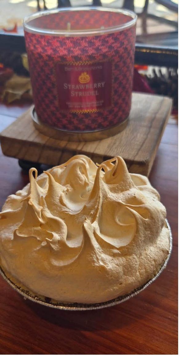 A lemon meringue pie with toasted peaks