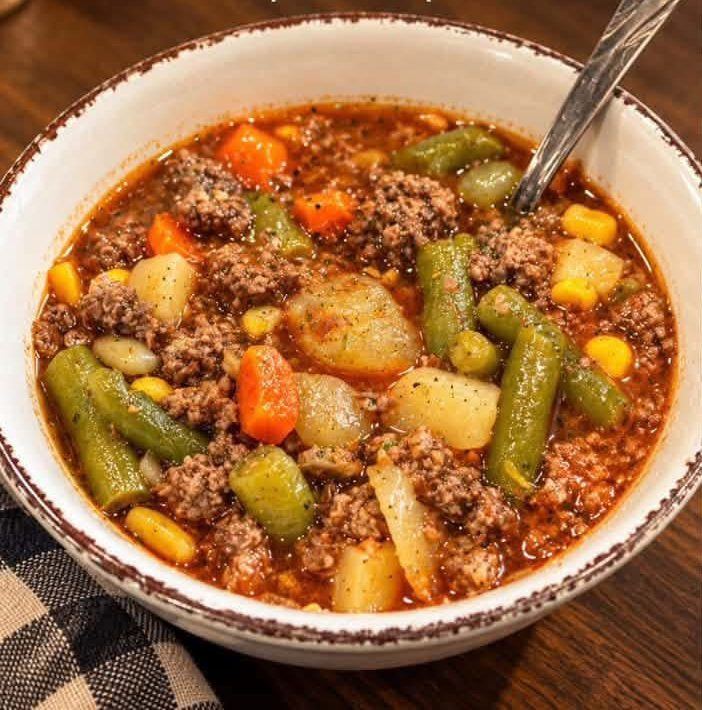 A bowl of hearty vegetable beef soup